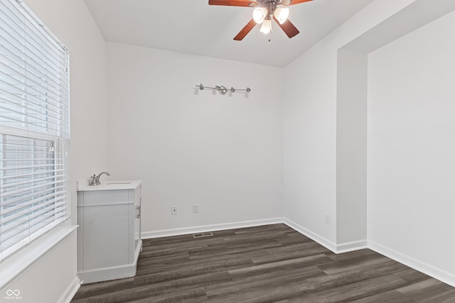 2833 Holiday Way, Greenwood, IN 46143 - empty room featuring ceiling fan and dark wood-style floors