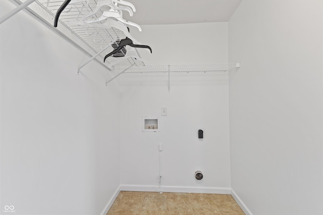 2833 Holiday Way, Greenwood, IN 46143 - laundry room featuring hookup for an electric dryer, hookup for a washing machine, and light tile patterned flooring