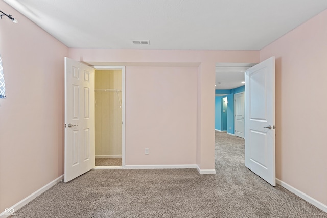 2833 Holiday Way, Greenwood, IN 46143 - unfurnished bedroom featuring light colored carpet