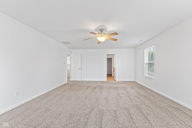 2833 Holiday Way, Greenwood, IN 46143 - spare room featuring ceiling fan and light carpet