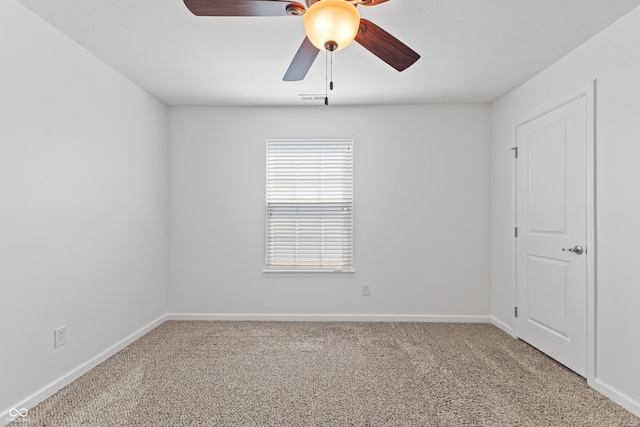 2833 Holiday Way, Greenwood, IN 46143 - carpeted spare room with a ceiling fan and baseboards