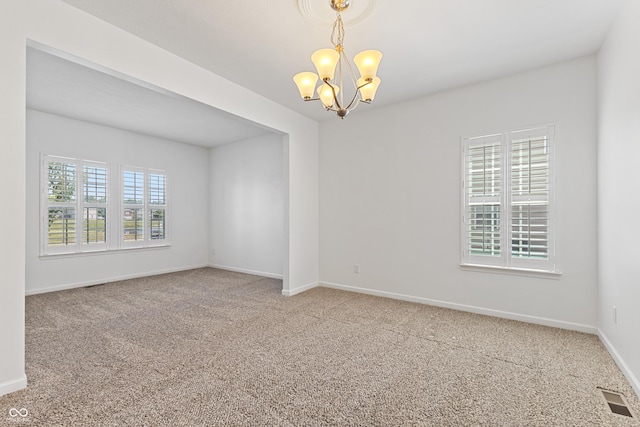 2833 Holiday Way, Greenwood, IN 46143 - unfurnished room featuring carpet flooring and a chandelier