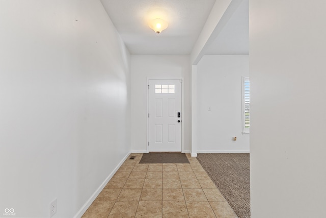 2833 Holiday Way, Greenwood, IN 46143 - foyer entrance with healthy amount of natural light and light carpet