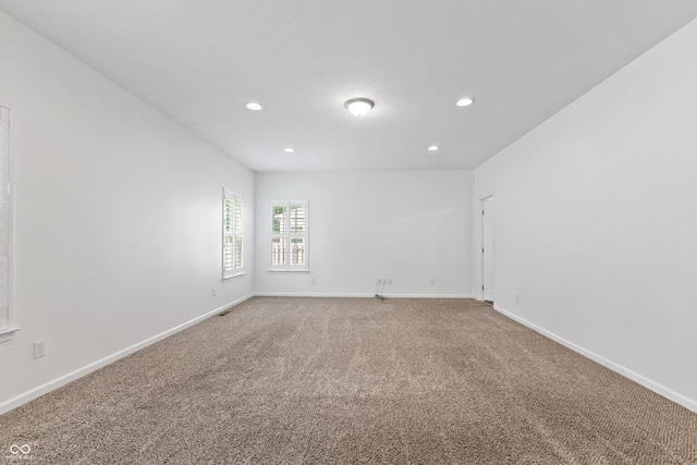 2833 Holiday Way, Greenwood, IN 46143 - unfurnished room with recessed lighting and light carpet