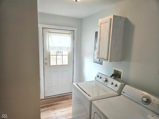 7422 S 575 W, Morgantown, IN 46160 - laundry area featuring cabinet space, separate washer and dryer, and light wood finished floors