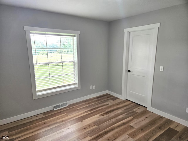 7422 S 575 W, Morgantown, IN 46160 - unfurnished room with healthy amount of natural light and wood finished floors