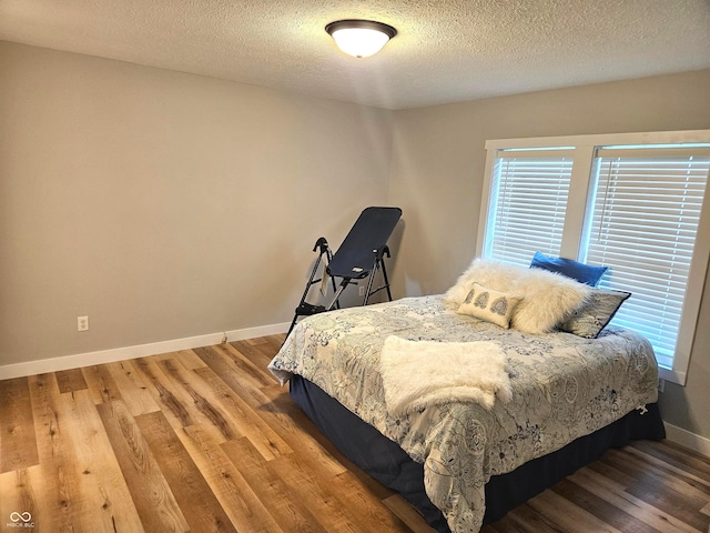 7422 S 575 W, Morgantown, IN 46160 - bedroom featuring wood finished floors and a textured ceiling