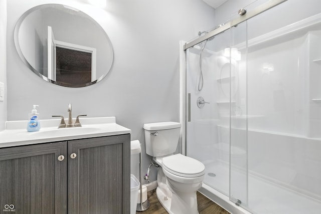 5875 Stroup Dr, Noblesville, IN 46062 - full bath featuring vanity, a shower stall, and wood finished floors