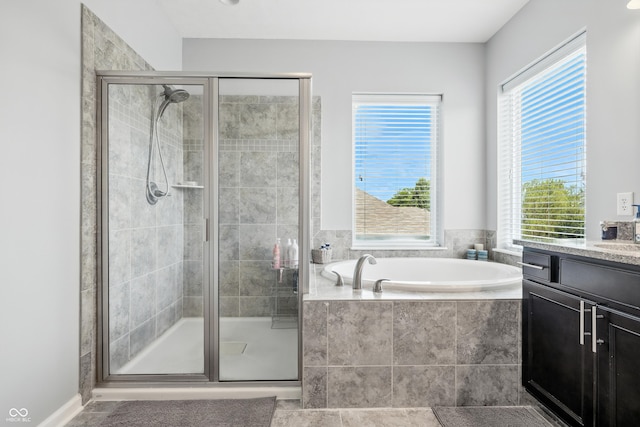 5875 Stroup Dr, Noblesville, IN 46062 - full bath featuring a garden tub, vanity, and a shower stall