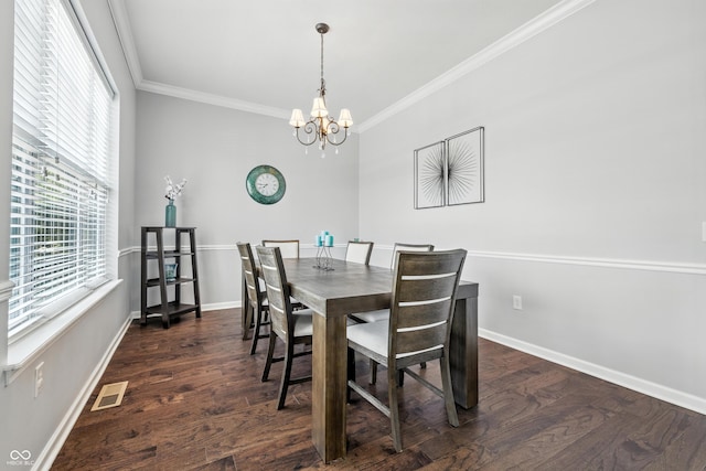 5875 Stroup Dr, Noblesville, IN 46062 - dining space with ornamental molding, a chandelier, and dark wood-type flooring