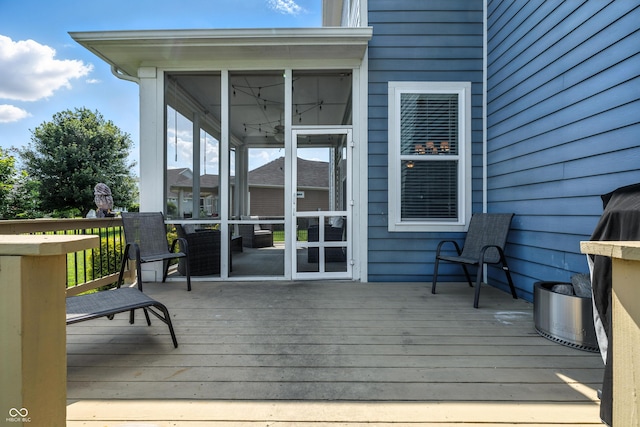 5875 Stroup Dr, Noblesville, IN 46062 - wooden deck featuring a sunroom