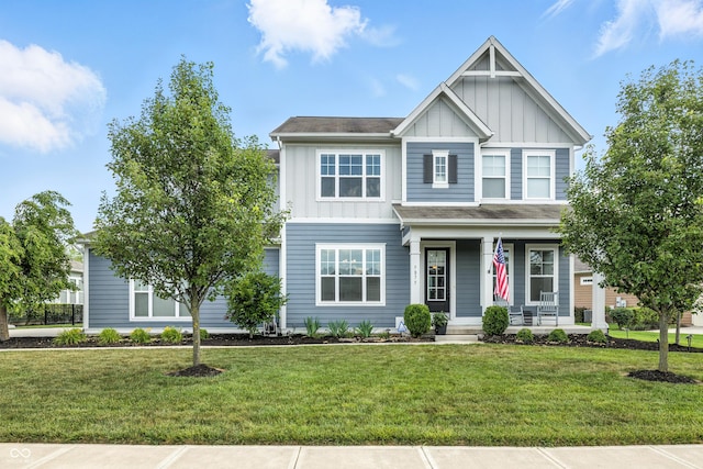 5875 Stroup Dr, Noblesville, IN 46062 - craftsman-style house with board and batten siding, covered porch, and a front yard