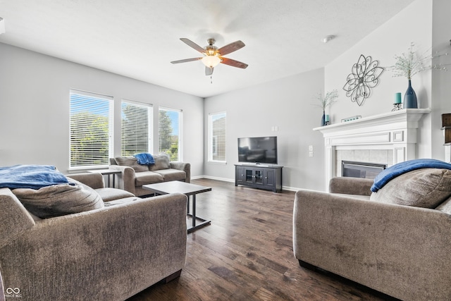 5875 Stroup Dr, Noblesville, IN 46062 - living room featuring dark wood-style floors, ceiling fan, and a fireplace