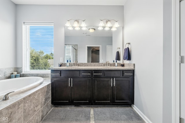 5875 Stroup Dr, Noblesville, IN 46062 - full bathroom with double vanity, a shower stall, and a bath