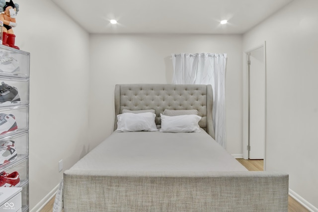 2149 Westline Dr, Columbus, IN 47203 - bedroom with wood finished floors and recessed lighting