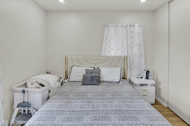 2149 Westline Dr, Columbus, IN 47203 - bedroom with wood finished floors and recessed lighting