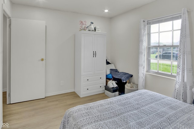 2149 Westline Dr, Columbus, IN 47203 - bedroom with light wood-style floors and recessed lighting