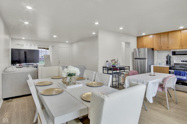 2149 Westline Dr, Columbus, IN 47203 - dining space featuring light wood-style floors and recessed lighting