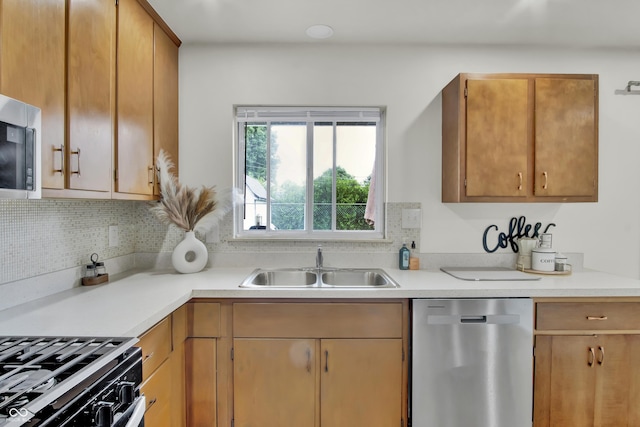2149 Westline Dr, Columbus, IN 47203 - kitchen with appliances with stainless steel finishes, light countertops, and decorative backsplash