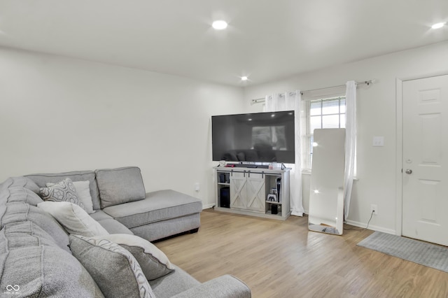 2149 Westline Dr, Columbus, IN 47203 - living area featuring wood finished floors and recessed lighting