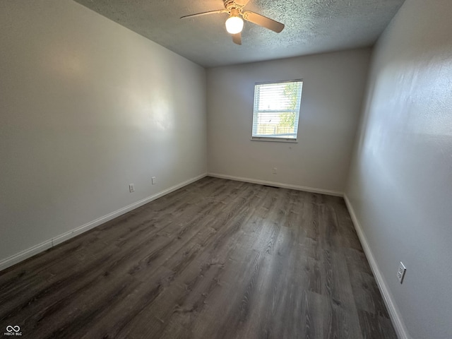 3708 Pleasant Creek Dr, Indianapolis, IN 46227 - empty room featuring dark wood-type flooring, ceiling fan, and a textured ceiling
