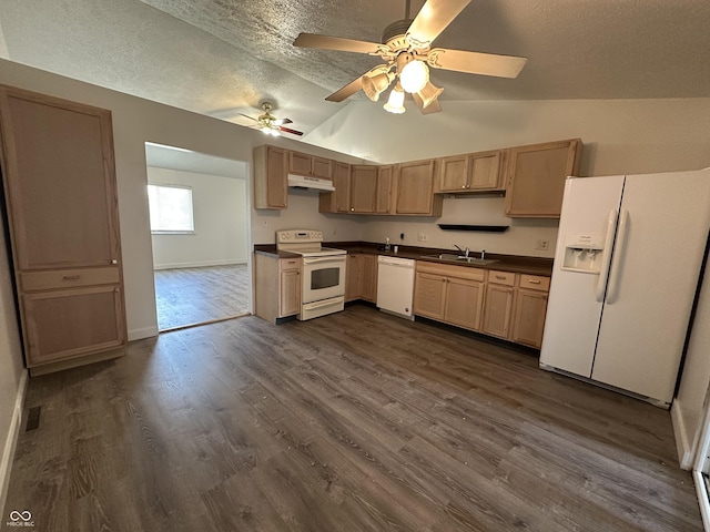 3708 Pleasant Creek Dr, Indianapolis, IN 46227 - kitchen featuring white appliances, lofted ceiling, dark countertops, under cabinet range hood, and a textured ceiling