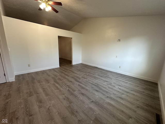 3708 Pleasant Creek Dr, Indianapolis, IN 46227 - empty room featuring a ceiling fan, lofted ceiling, and dark wood-type flooring