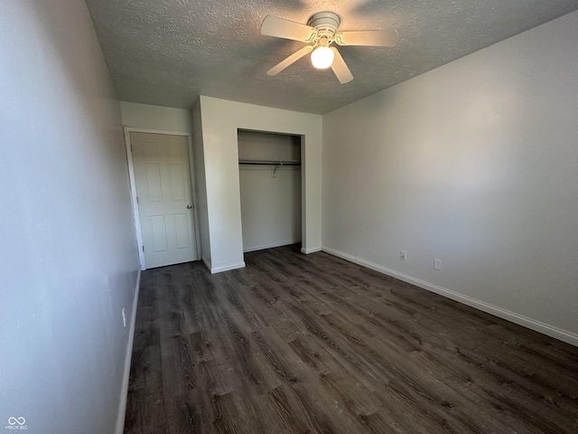 3708 Pleasant Creek Dr, Indianapolis, IN 46227 - unfurnished bedroom featuring a textured ceiling, dark wood-style floors, a closet, and a ceiling fan
