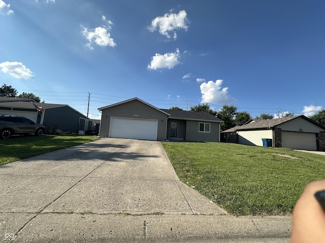 3708 Pleasant Creek Dr, Indianapolis, IN 46227 - ranch-style house with a front yard, driveway, and an attached garage