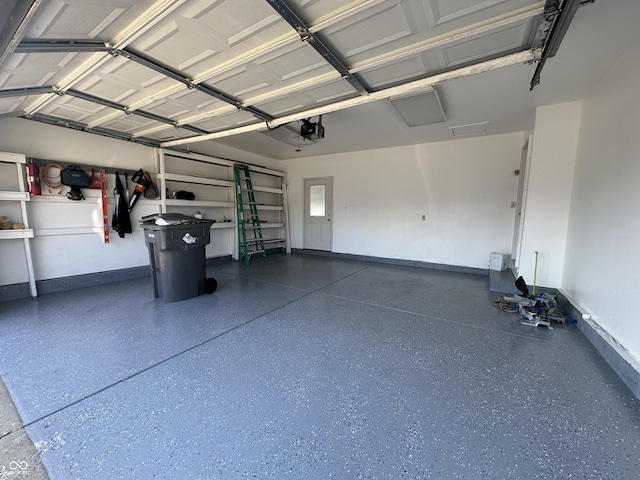 3708 Pleasant Creek Dr, Indianapolis, IN 46227 - garage featuring a garage door opener and baseboards