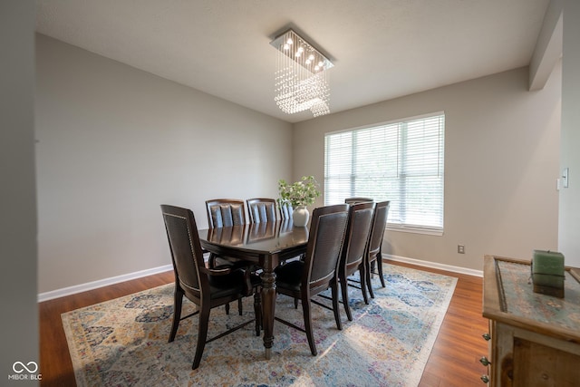 268 Larimar Dr, Whiteland, IN 46184 - dining area featuring a chandelier and wood finished floors