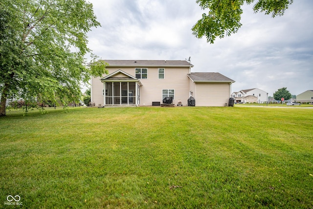 268 Larimar Dr, Whiteland, IN 46184 - rear view of house with a sunroom and a lawn