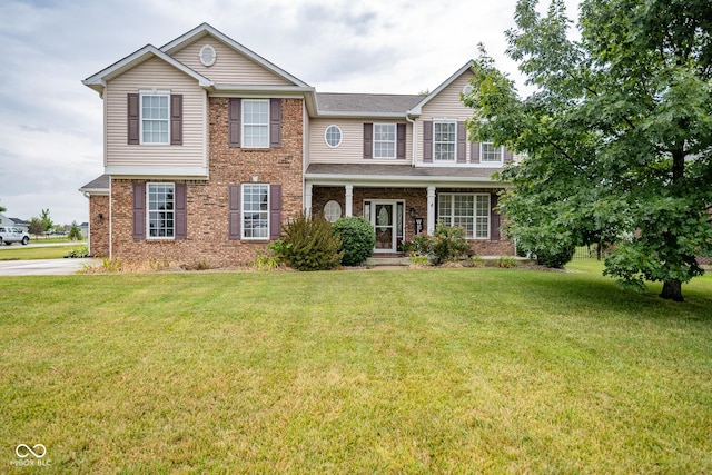 268 Larimar Dr, Whiteland, IN 46184 - view of front facade featuring a front lawn and brick siding