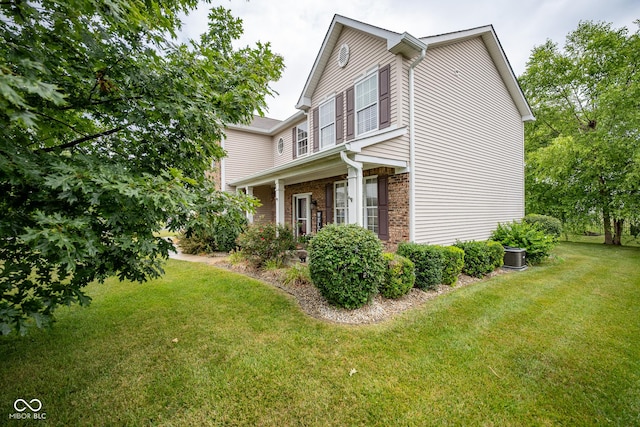 268 Larimar Dr, Whiteland, IN 46184 - view of side of home featuring a lawn and brick siding