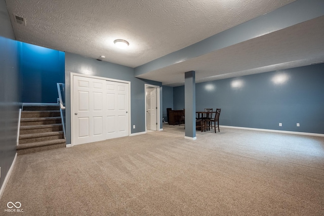 268 Larimar Dr, Whiteland, IN 46184 - finished basement with carpet floors, stairway, and a textured ceiling