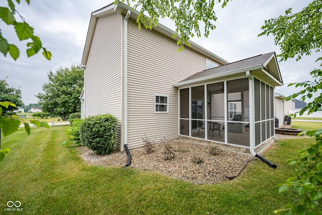 268 Larimar Dr, Whiteland, IN 46184 - rear view of property featuring a sunroom and a lawn