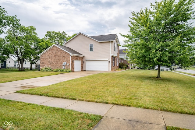 268 Larimar Dr, Whiteland, IN 46184 - view of front facade with a garage, brick siding, a front yard, and concrete driveway