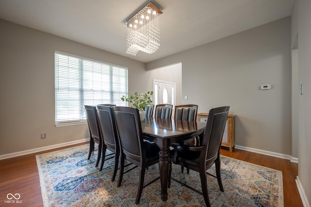 268 Larimar Dr, Whiteland, IN 46184 - dining space with a chandelier and wood finished floors