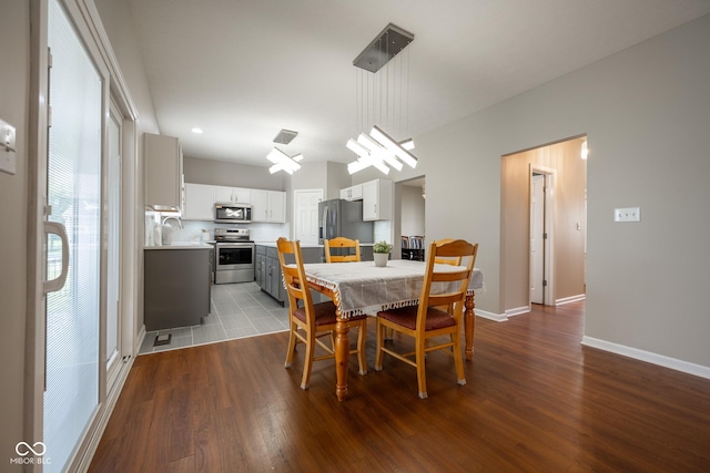 268 Larimar Dr, Whiteland, IN 46184 - dining space featuring dark wood-style floors and baseboards