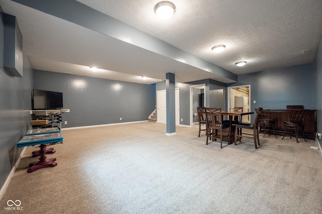 268 Larimar Dr, Whiteland, IN 46184 - dining room featuring carpet flooring, stairs, a textured ceiling, and a bar