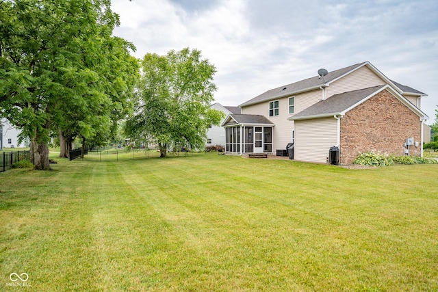 268 Larimar Dr, Whiteland, IN 46184 - view of yard featuring a sunroom