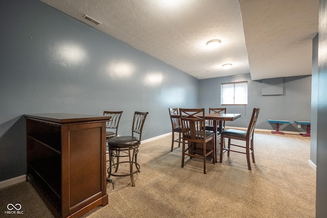 268 Larimar Dr, Whiteland, IN 46184 - dining room with a textured ceiling and light carpet