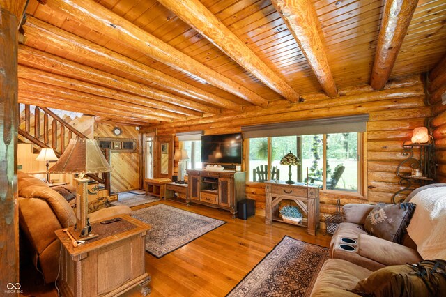 7813 W 50 S, Morgantown, IN 46160 - living area featuring healthy amount of natural light, stairway, a wood ceiling with exposed beams, and wood finished floors