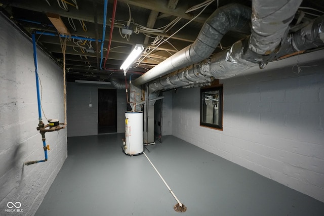 916 E 54th St, Indianapolis, IN 46220 - unfinished basement featuring water heater and concrete block wall