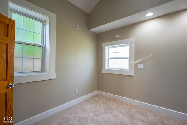 916 E 54th St, Indianapolis, IN 46220 - carpeted spare room with recessed lighting and vaulted ceiling