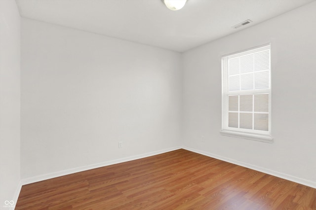 5422 Bluff View Dr, Indianapolis, IN 46217 - empty room featuring wood finished floors and baseboards