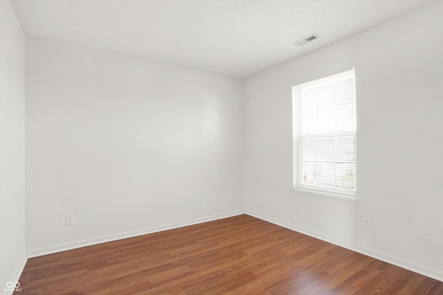 5422 Bluff View Dr, Indianapolis, IN 46217 - unfurnished room with wood finished floors and baseboards
