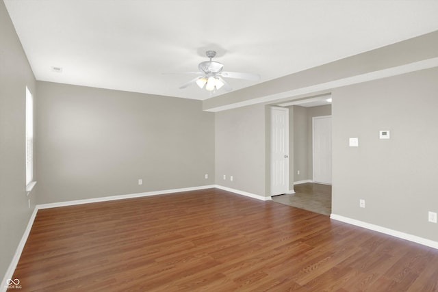 5422 Bluff View Dr, Indianapolis, IN 46217 - unfurnished room with a ceiling fan and wood finished floors