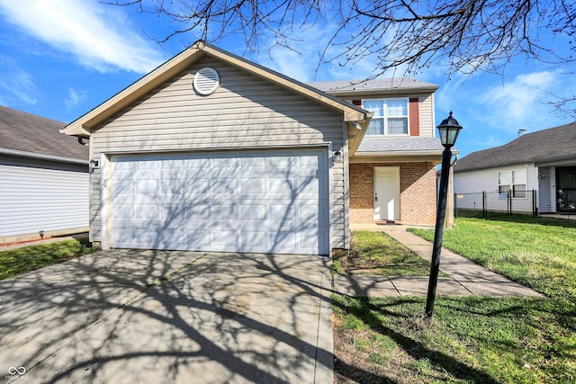 5422 Bluff View Dr, Indianapolis, IN 46217 - view of front of home featuring a garage, driveway, and brick siding