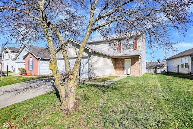 5422 Bluff View Dr, Indianapolis, IN 46217 - view of front of home featuring concrete driveway, brick siding, and an attached garage